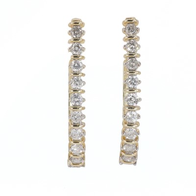 Lot 56 - A pair of 9ct gold diamond bar hoop earrings