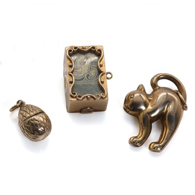 Lot 157 - A group of three gold charms