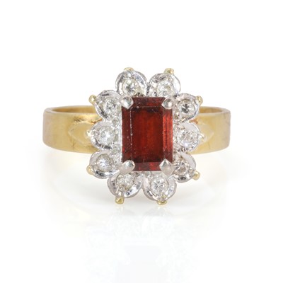Lot 68 - A garnet and diamond cluster ring