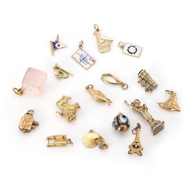 Lot 288 - A collection of gold and gilt metal charms