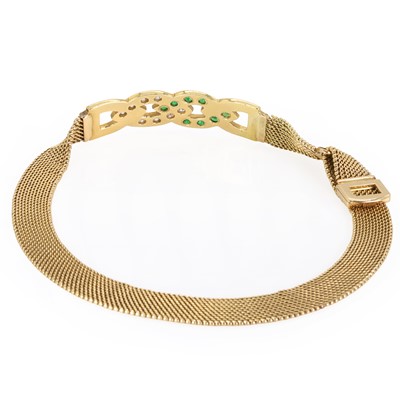 Lot 178 - A gold diamond and emerald mesh link bracelet
