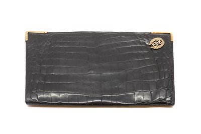 Lot 323 - A 9ct gold mounted crocodile leather wallet