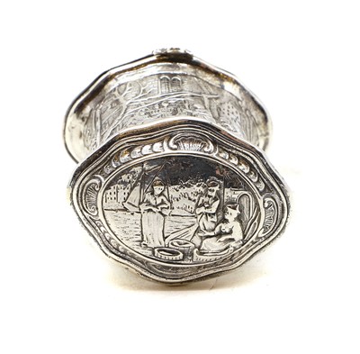 Lot 38 - A repousse silver snuff or tobacco box