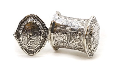 Lot 38 - A repousse silver snuff or tobacco box