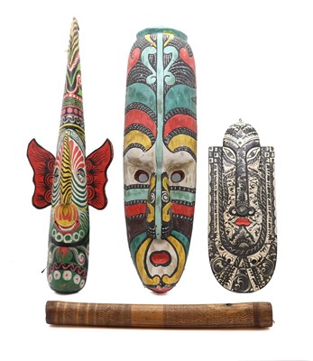 Lot 267 - A group of three painted wood masks