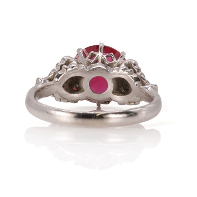 Lot 17 - A white gold synthetic ruby and diamond set ring