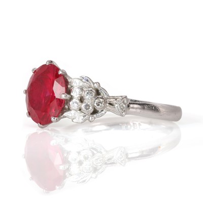 Lot 17 - A white gold synthetic ruby and diamond set ring