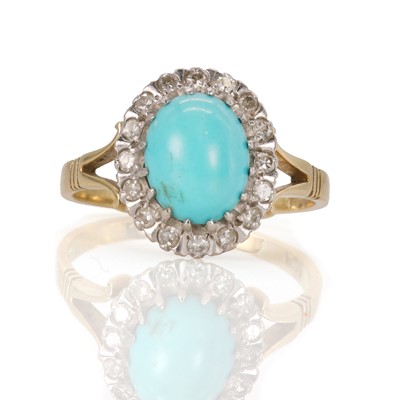 Lot 26 - An 18ct gold turquoise and diamond set oval ring