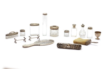 Lot 54 - A collection of silver mounted dressing table items