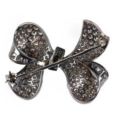 Lot 81 - A mid-20th century diamond ribbon bow brooch