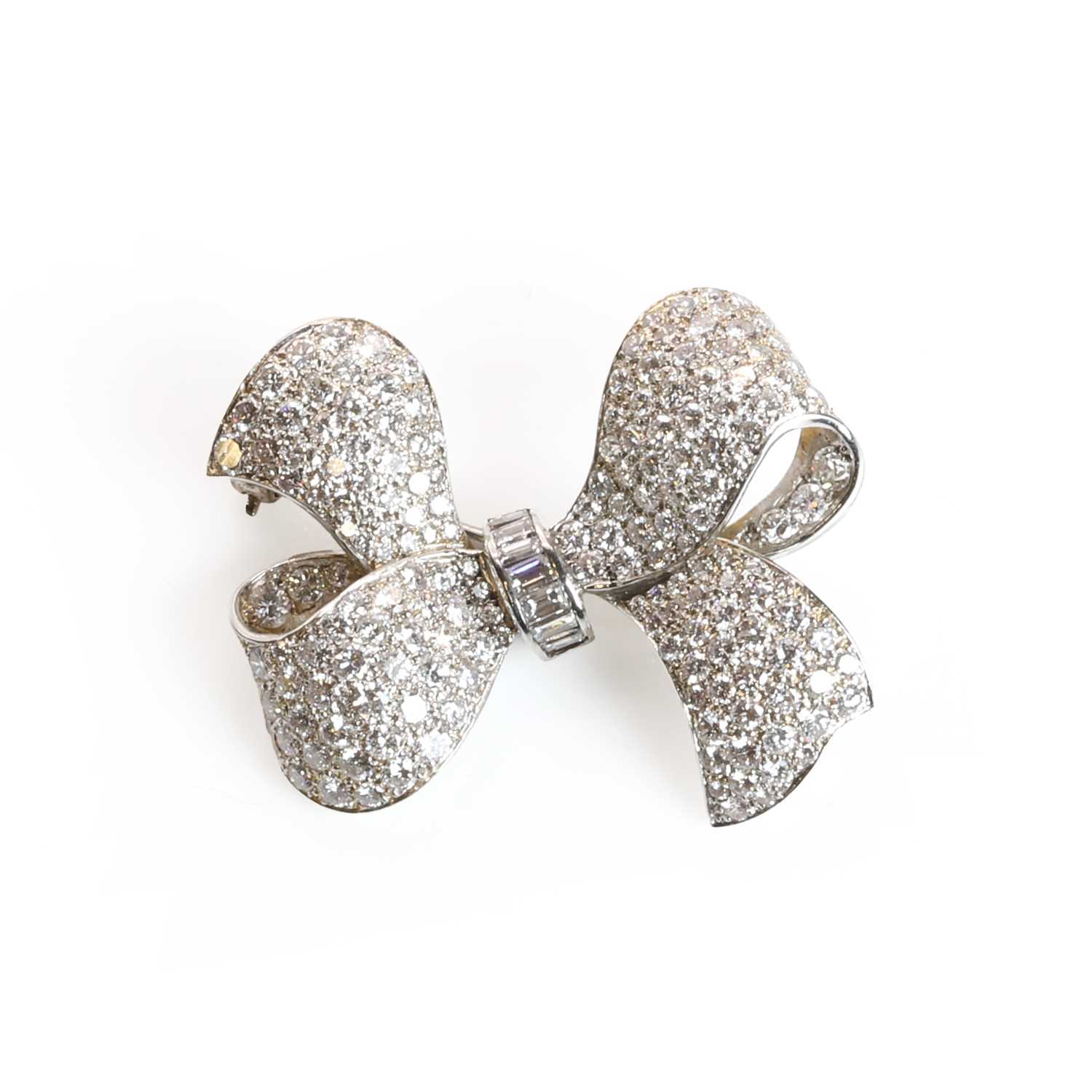 Lot 81 - A mid-20th century diamond ribbon bow brooch