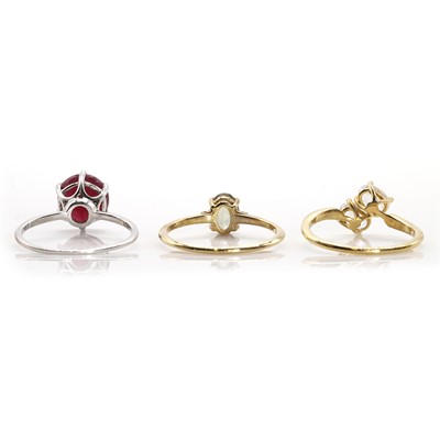 Lot 90 - A 9ct white gold fracture filled ruby ring and a group gemstone rings