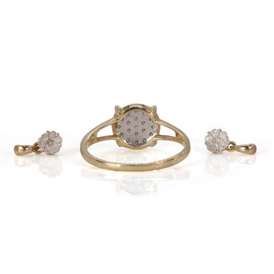 Lot 55 - A 9ct gold diamond cluster ring and two small diamond cluster pendants
