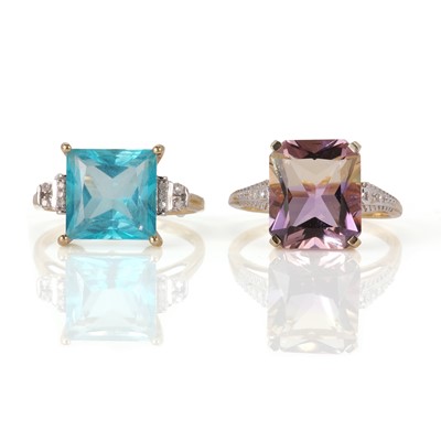 Lot 148 - Two coloured gemstone rings with diamond shoulders
