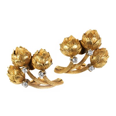 Lot 95 - A pair of gold diamond set novelty clip earrings