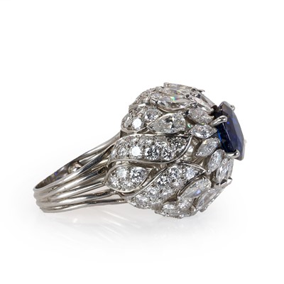 Lot 86 - A mid 20th century sapphire and diamond bombé ring