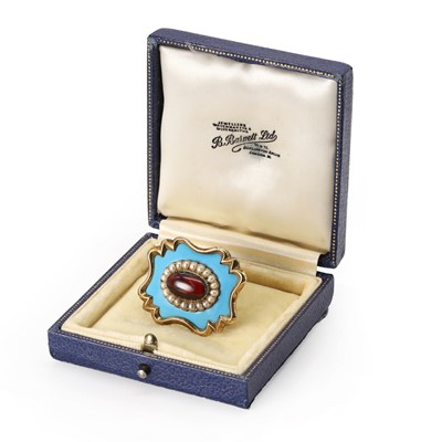 Lot 10 - A turquoise enamel, seed pearl and cabochon garnet memorial brooch