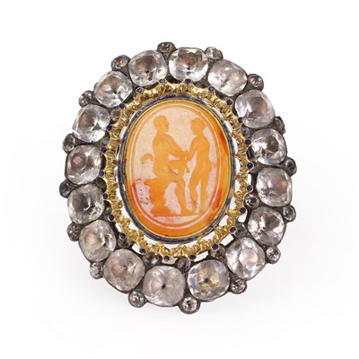 Lot 4 - A silver mounted black dot paste and carnelian intaglio brooch