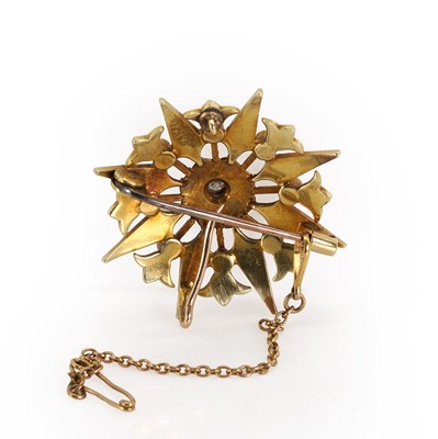Lot 29 - An Edwardian seed pearl and diamond starburst brooch/pendant