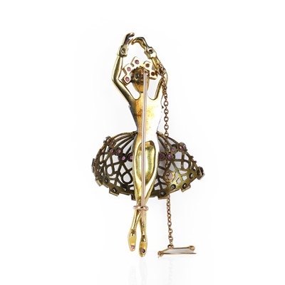 Lot 79 - A gold ruby and diamond set Ballerina brooch