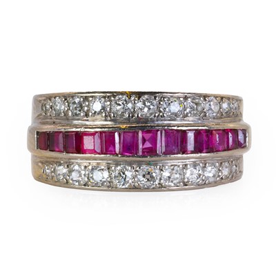 Lot 76 - A white gold ruby and diamond three row dress ring