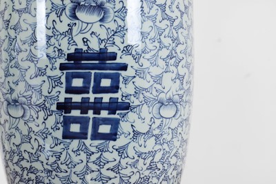 Lot 67 - A pair of blue and white porcelain table lamps