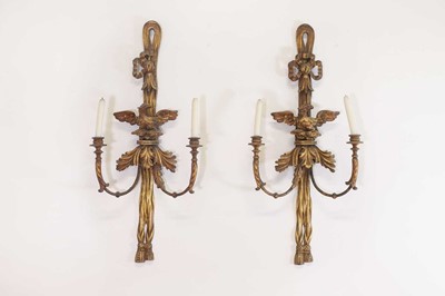 Lot 373 - A pair of George III-style carved giltwood and gesso wall sconces