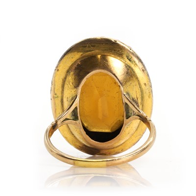 Lot 27 - A citrine and split pearl oval cluster ring