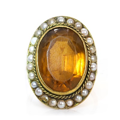 Lot 27 - A citrine and split pearl oval cluster ring