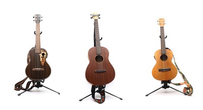 Lot 171 - Three ukuleles