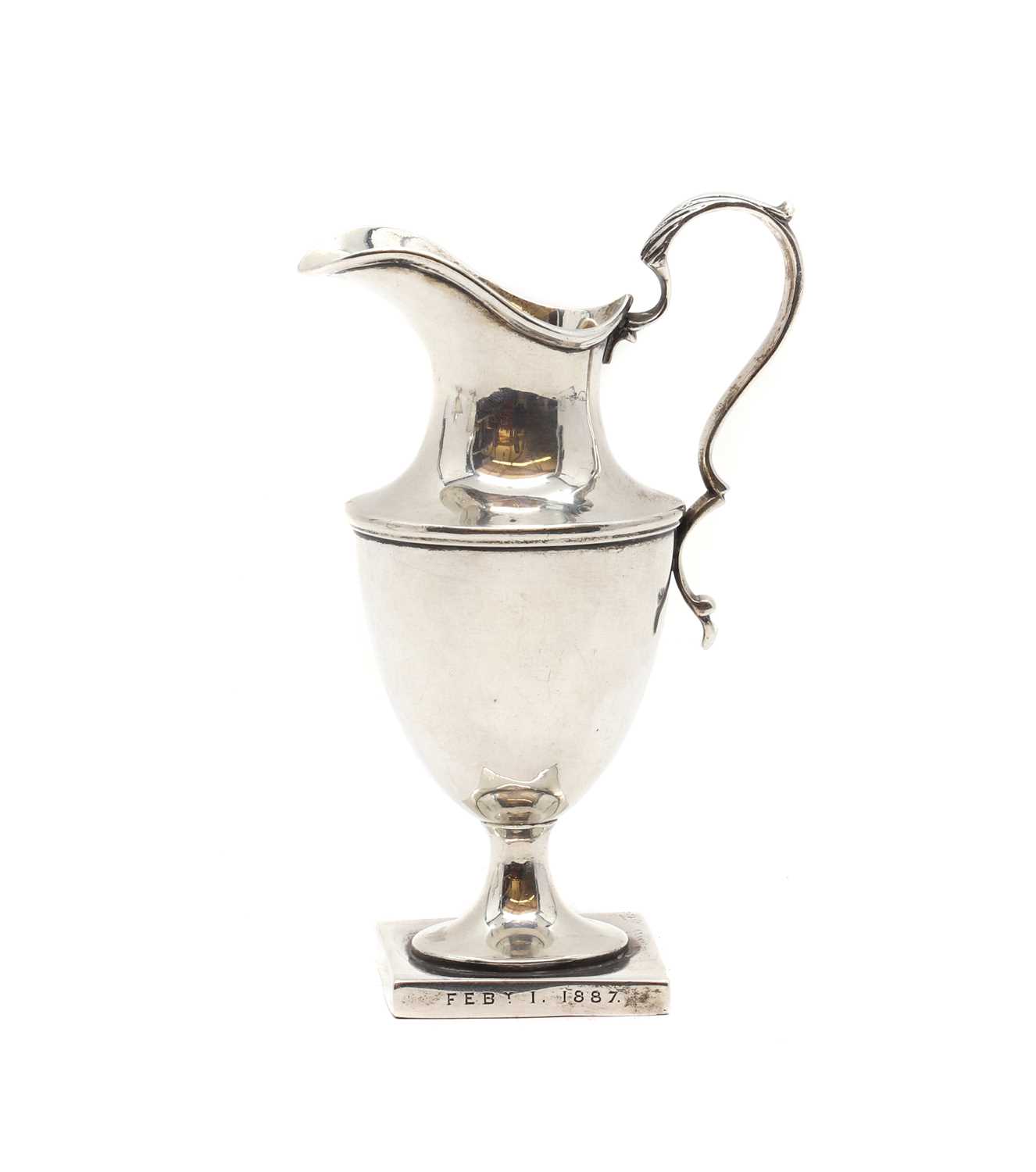 Lot 9 - A George III silver cream jug