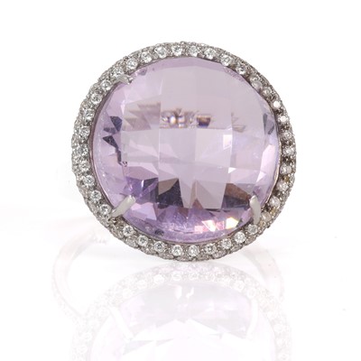 Lot 112 - An amethyst and diamond halo cluster ring, by Giovane of New York