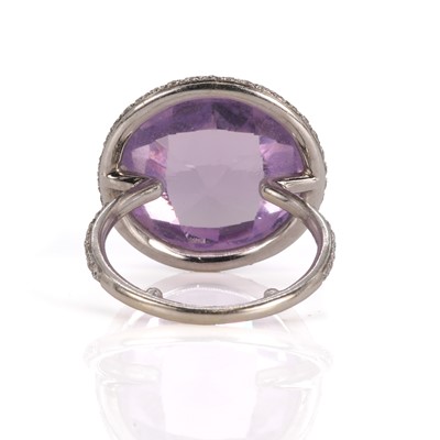 Lot 112 - An amethyst and diamond halo cluster ring, by Giovane of New York