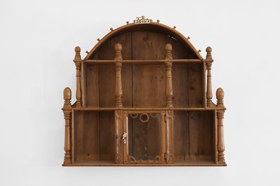 Lot 140 - A set of fruitwood and pine wall-hanging shelves