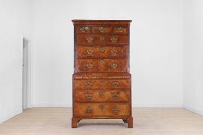 Lot 25 - A George II figured walnut secretaire chest on chest
