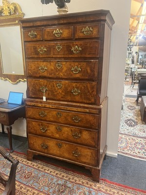 Lot 25 - A George II figured walnut secretaire chest on chest