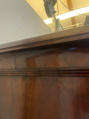 Lot 25 - A George II figured walnut secretaire chest on chest
