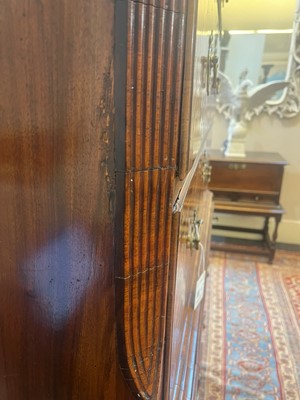 Lot 25 - A George II figured walnut secretaire chest on chest