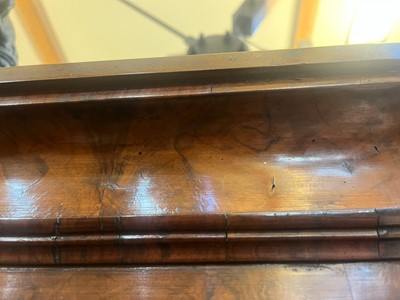 Lot 25 - A George II figured walnut secretaire chest on chest