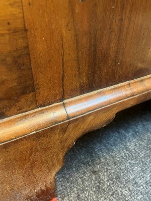 Lot 25 - A George II figured walnut secretaire chest on chest