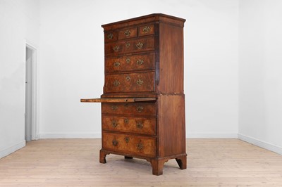 Lot 25 - A George II figured walnut secretaire chest on chest