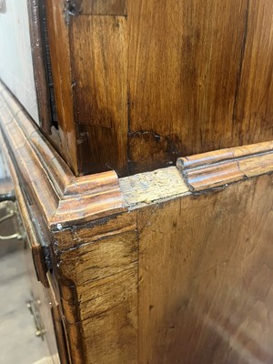 Lot 25 - A George II figured walnut secretaire chest on chest