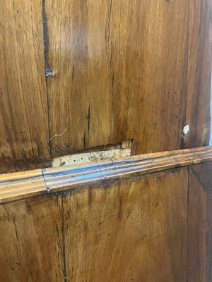 Lot 25 - A George II figured walnut secretaire chest on chest