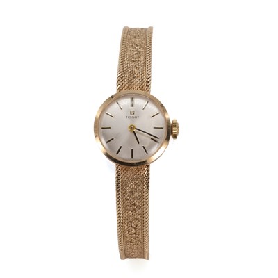 Lot 297 - A ladies' 9ct gold Tissot mechanical bracelet watch