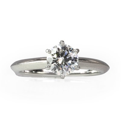 Lot 229 - A platinum diamond single stone ring, by Tiffany & Co.