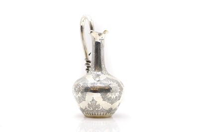 Lot 30 - A Victorian silver claret jug