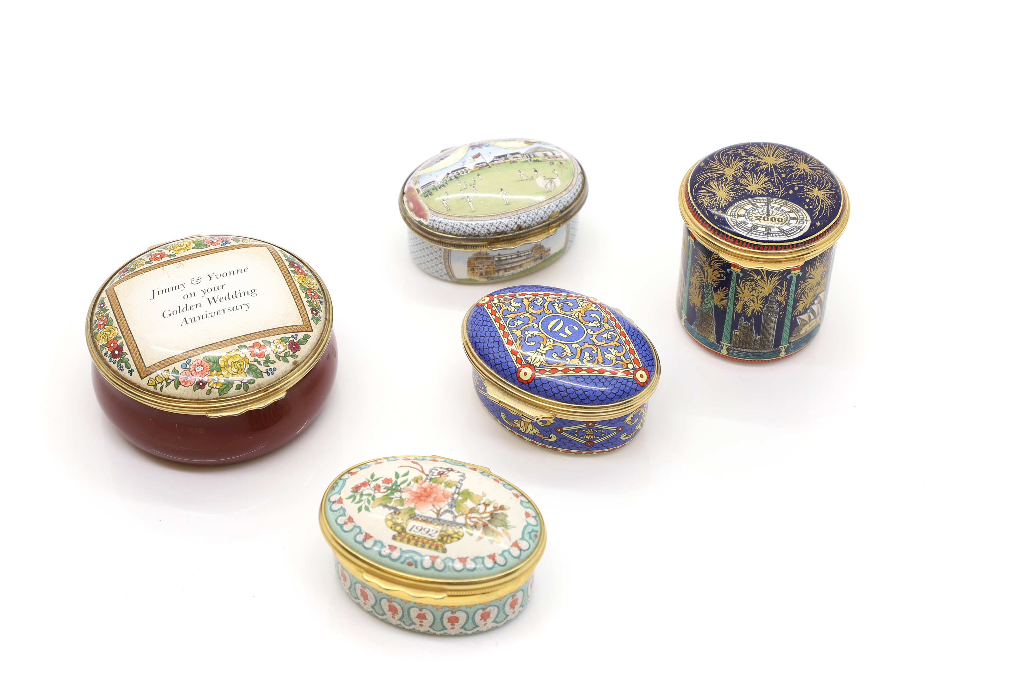 Lot 214 - A group of five Halcyon Days enamel pill