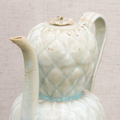 Lot 18 - A Chinese qingbai ware ewer and cover
