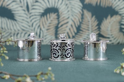 Lot 249 - A composed set of three George IV/William IV silver mustard pots