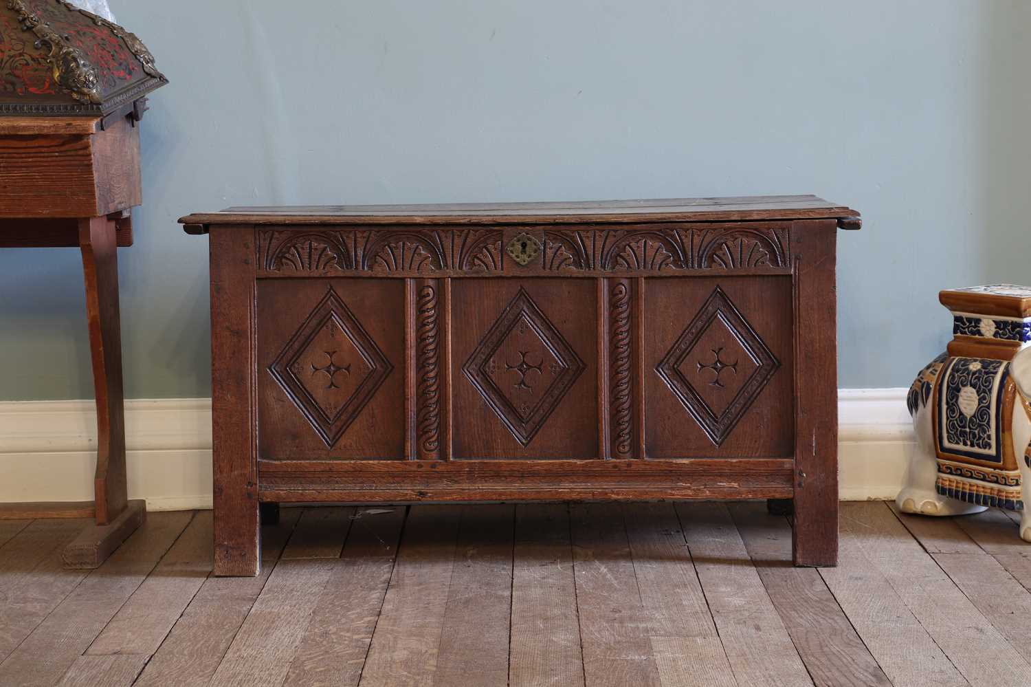 Lot 47 - An oak coffer